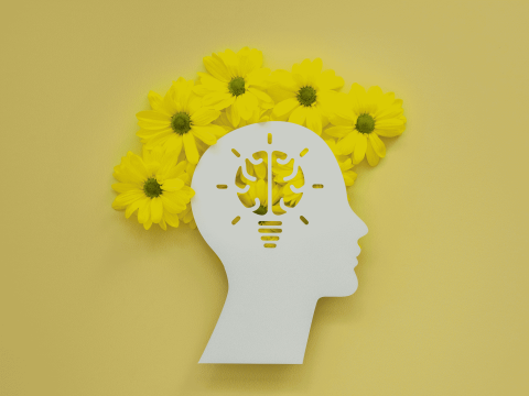 flat-lay-assortment-optimism-concept-with-flowers1920